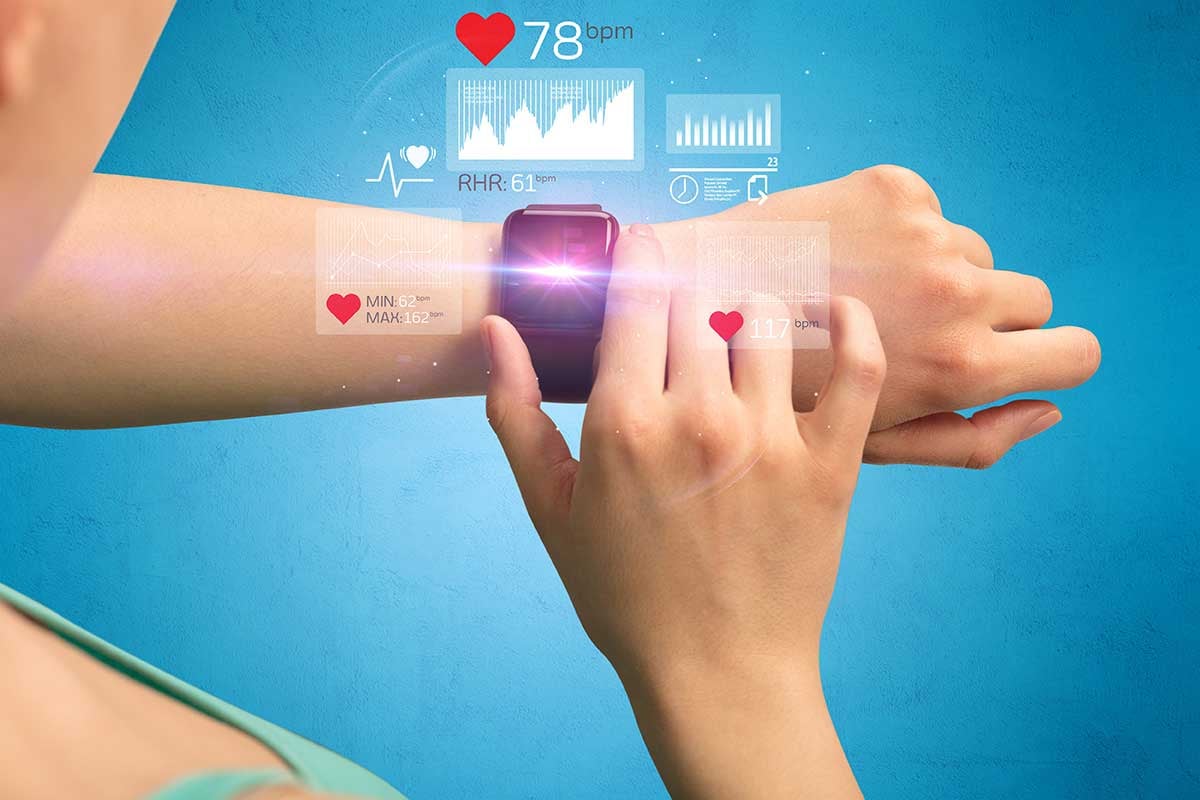 female-hand-with-smartwatch-and-health-applications-1200x800