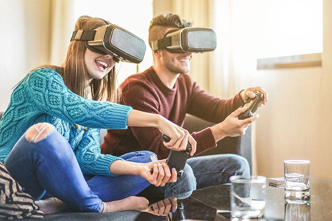 friends-playing-video-games-wearing-virtual-reality-glasses